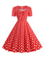 Abito a ruota pois fiocco a cuore anni '50