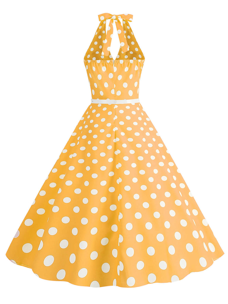 Abito a ruota a pois con scollo all'americana anni '50