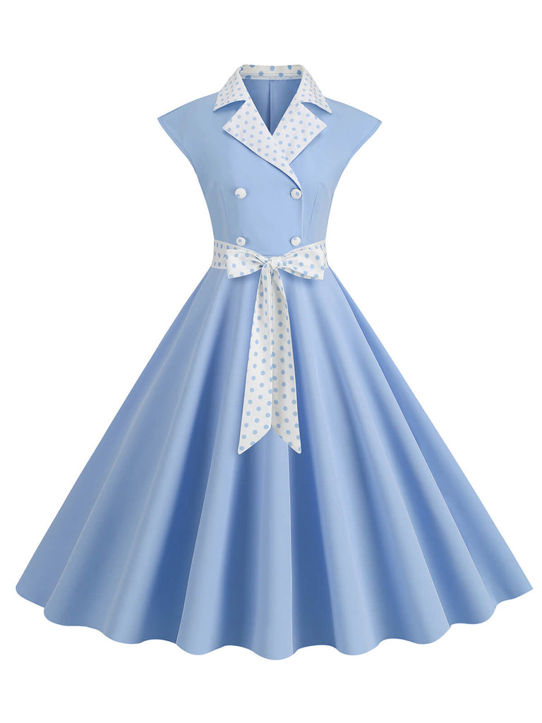 Abito a pois a contrasto con cintura e fiocco anni '50