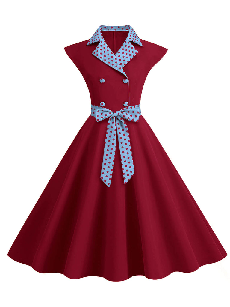 Abito a pois a contrasto con cintura e fiocco anni '50
