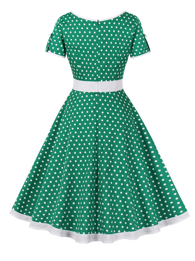 Abito abbottonato con pois a contrasto anni '50