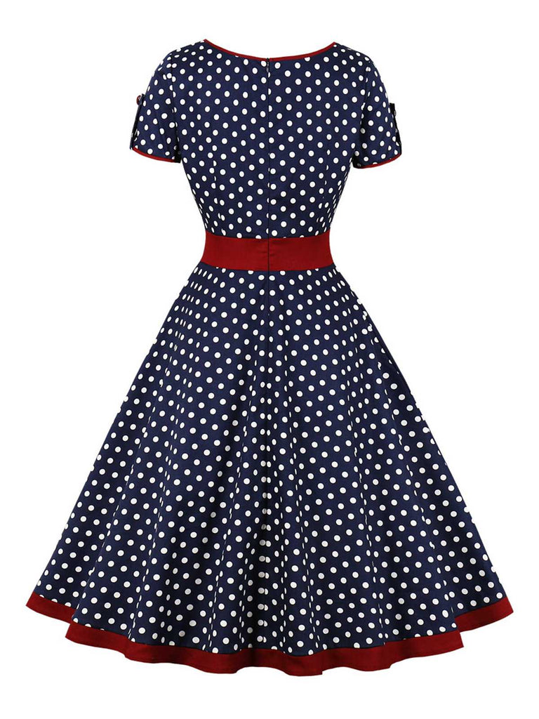 Abito abbottonato con pois a contrasto anni '50