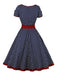 Abito abbottonato con pois a contrasto anni '50