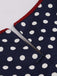 Abito abbottonato con pois a contrasto anni '50