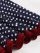 Abito abbottonato con pois a contrasto anni '50