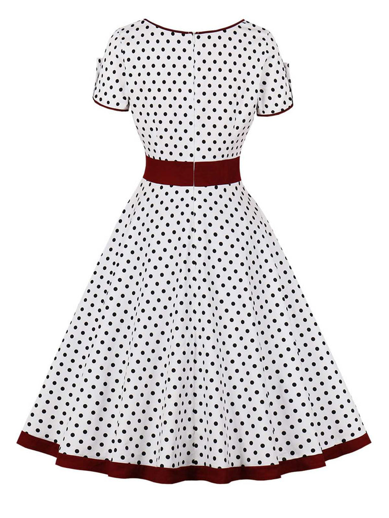 Abito abbottonato con pois a contrasto anni '50