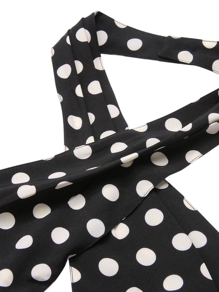 Tuta lunga con incrocio a pois nero anni '40