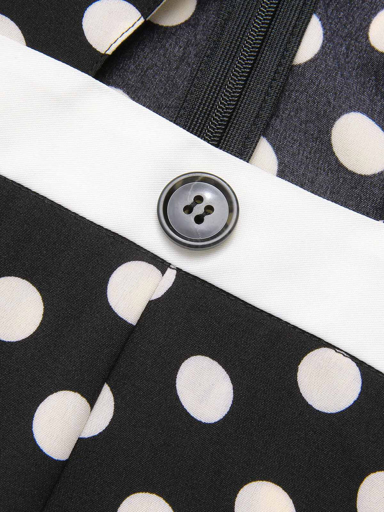 Tuta lunga con incrocio a pois nero anni '40