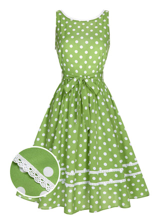 Abito a pois in pizzo con fiocco verde anni '50