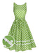 Abito a pois in pizzo con fiocco verde anni '50