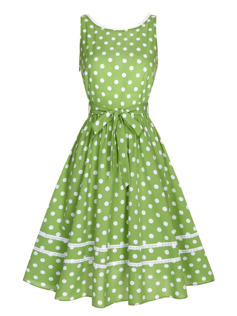 Abito a pois in pizzo con fiocco verde anni '50