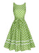 Abito a pois in pizzo con fiocco verde anni '50