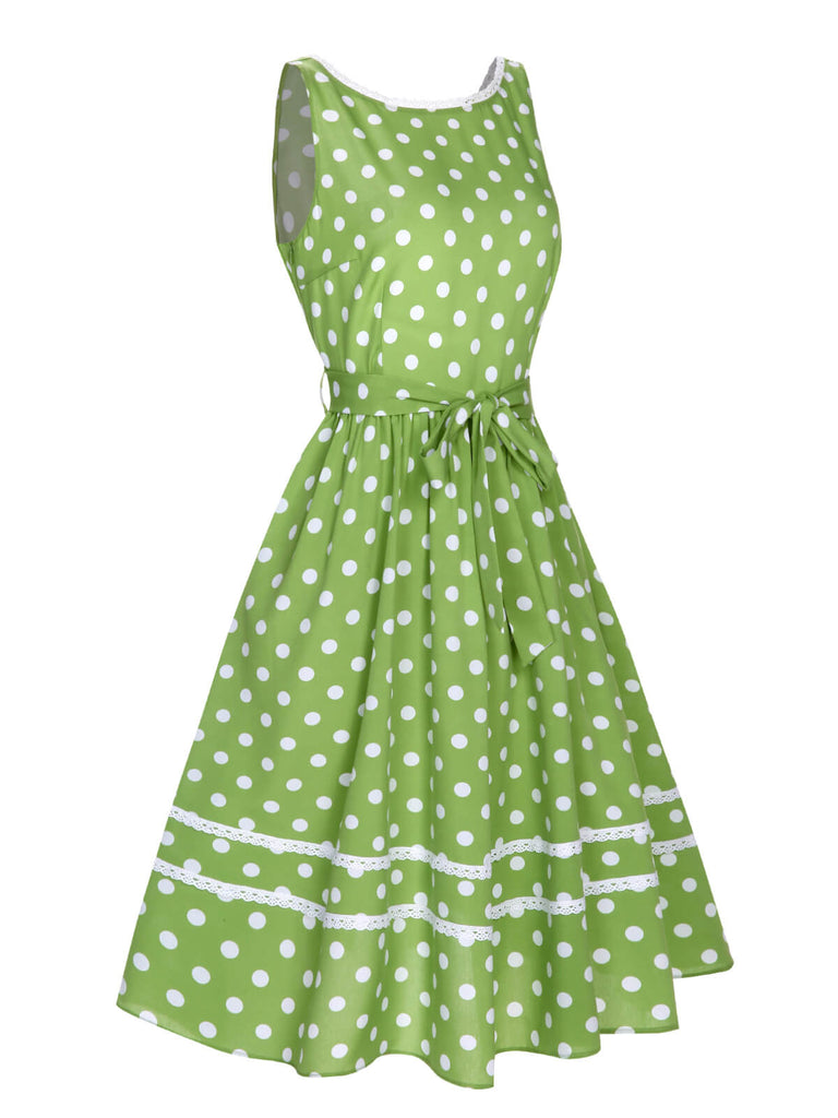Abito a pois in pizzo con fiocco verde anni '50