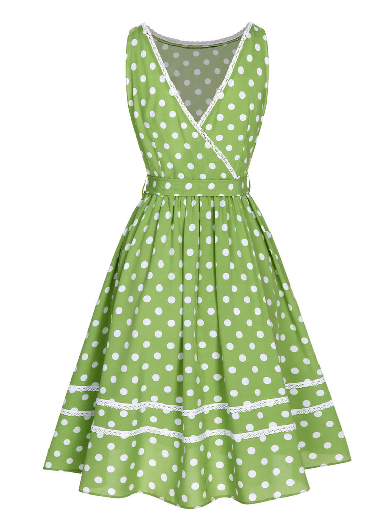 Abito a pois in pizzo con fiocco verde anni '50