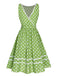 Abito a pois in pizzo con fiocco verde anni '50