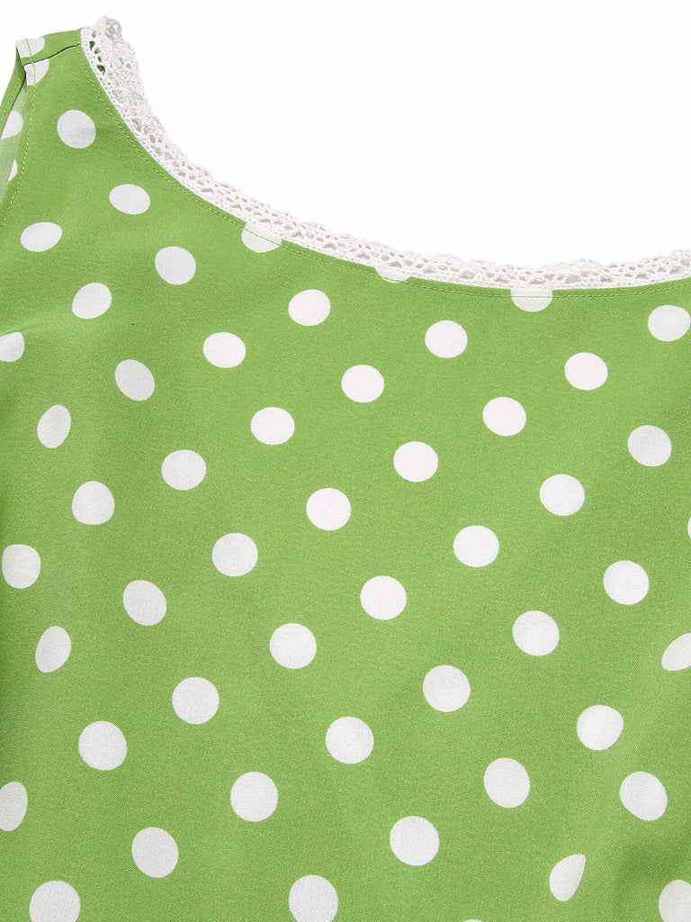 Abito a pois in pizzo con fiocco verde anni '50