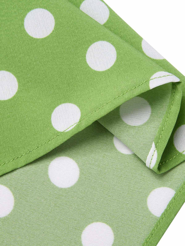 Abito a pois in pizzo con fiocco verde anni '50
