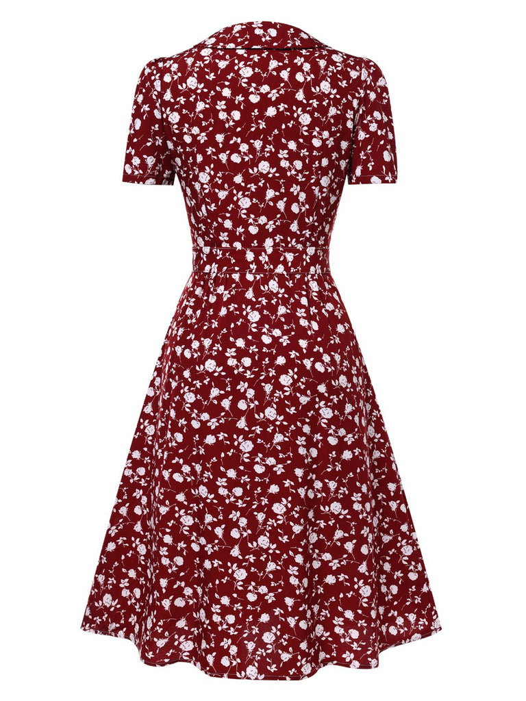 Abito floreale a risvolto bottoni rosso anni '40