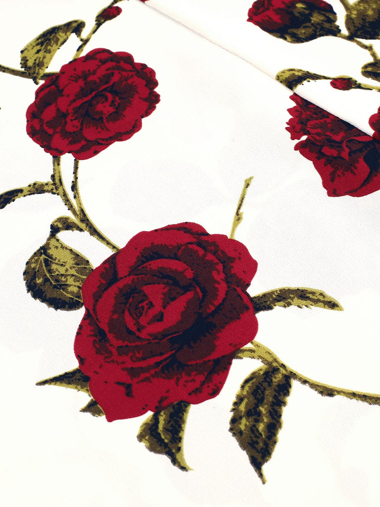 Abito con scollo all'americana e rose fiocco rosso anni '50