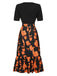 Abito patchwork floreale con scollatura irregolare nero anni '30