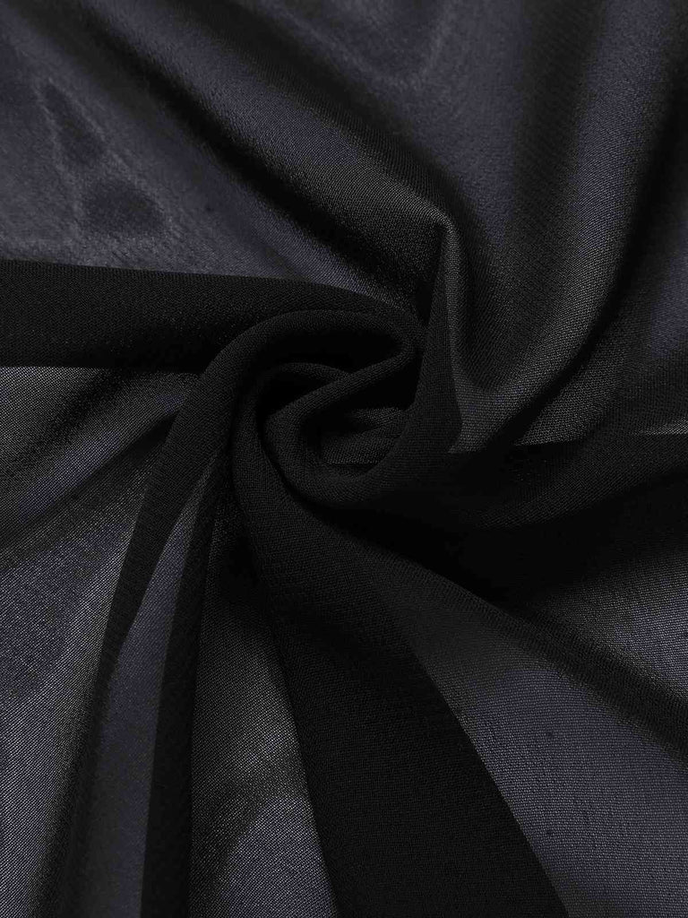 Mantella trasparente con ali di pipistrello nero anni '50