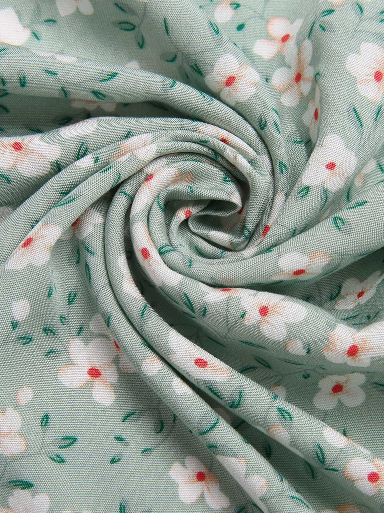 Abito floreale e orlo irregolare scollo a V verde anni '40