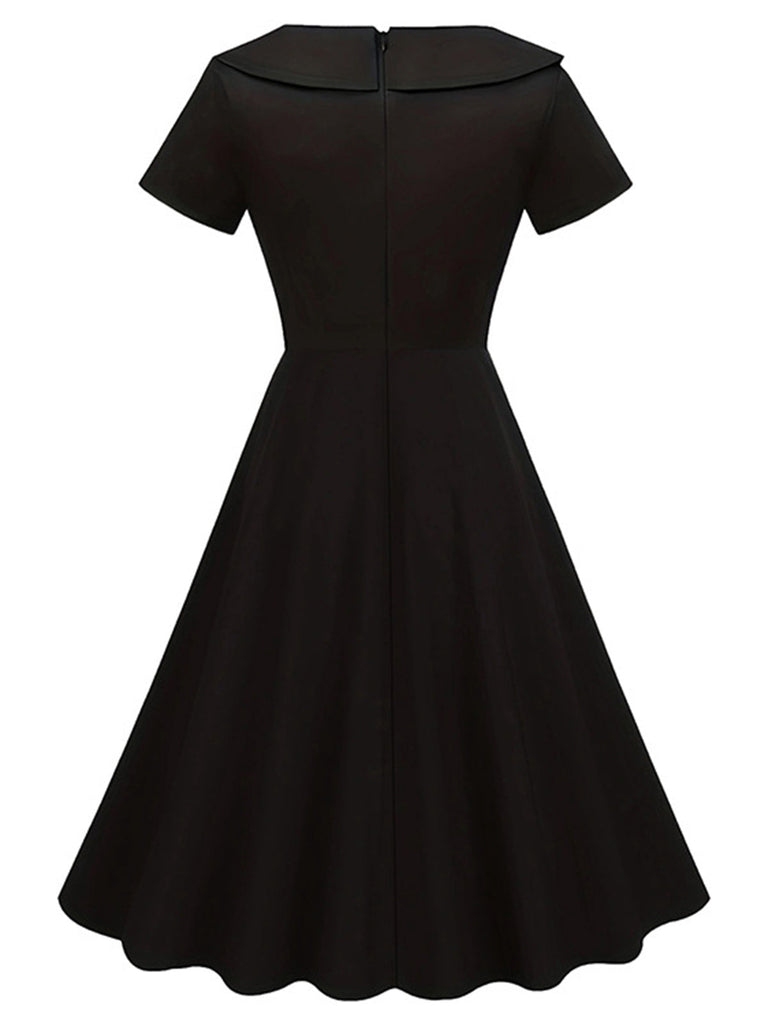 Abito con revers abbottonato nero anni '40
