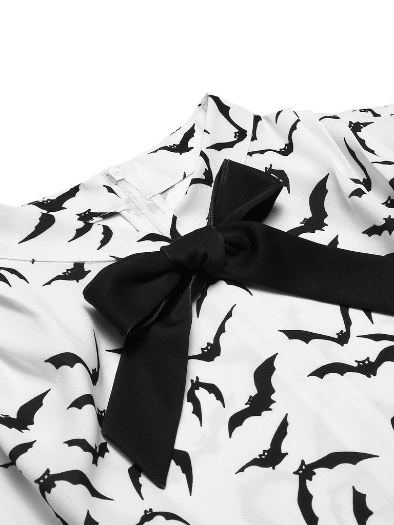 Abito a tubino pipistrello fiocco e revers nero anni '60