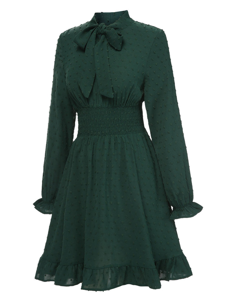 Abito con fiocco testurizzato verde anni '40