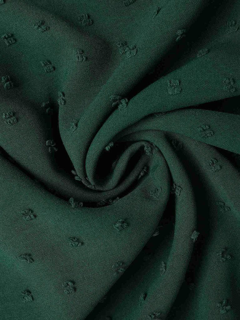 Abito con fiocco testurizzato verde anni '40