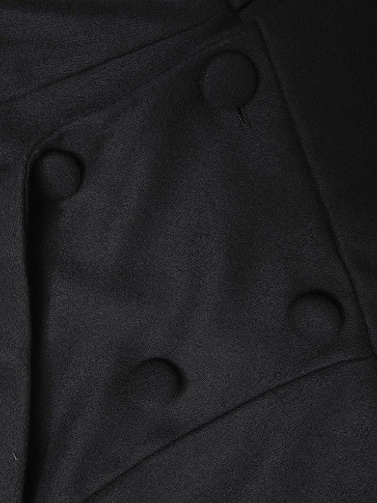 Cappotto con maniche a lanterna e ampi revers nero anni '60