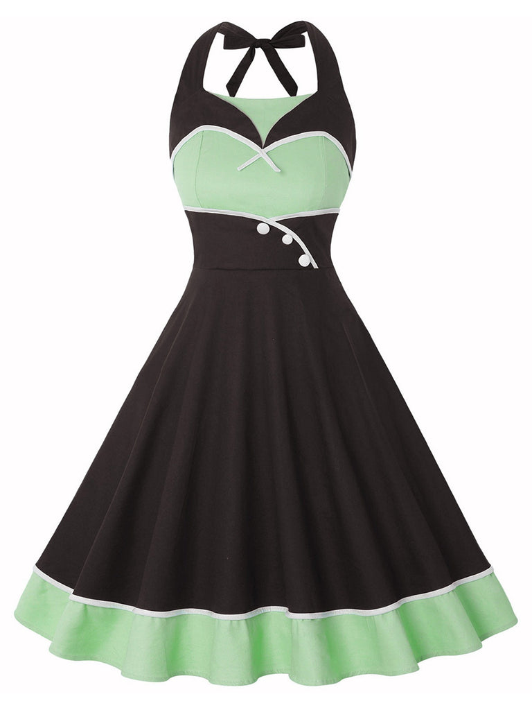 Abito a pois a contrasto con scollo all'americana anni '50