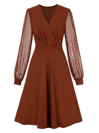 Abito patchwork a pois tinta unita con scollo a V anni '40