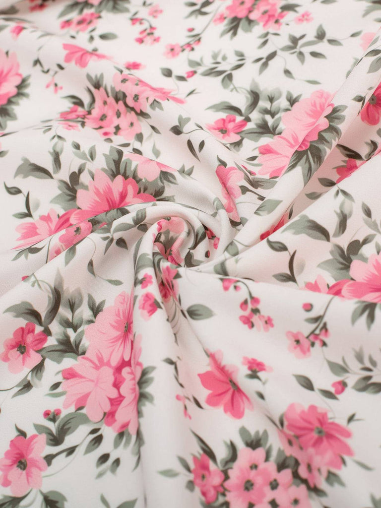 Abito a ruota con fiori a fiorellini rosa anni '50