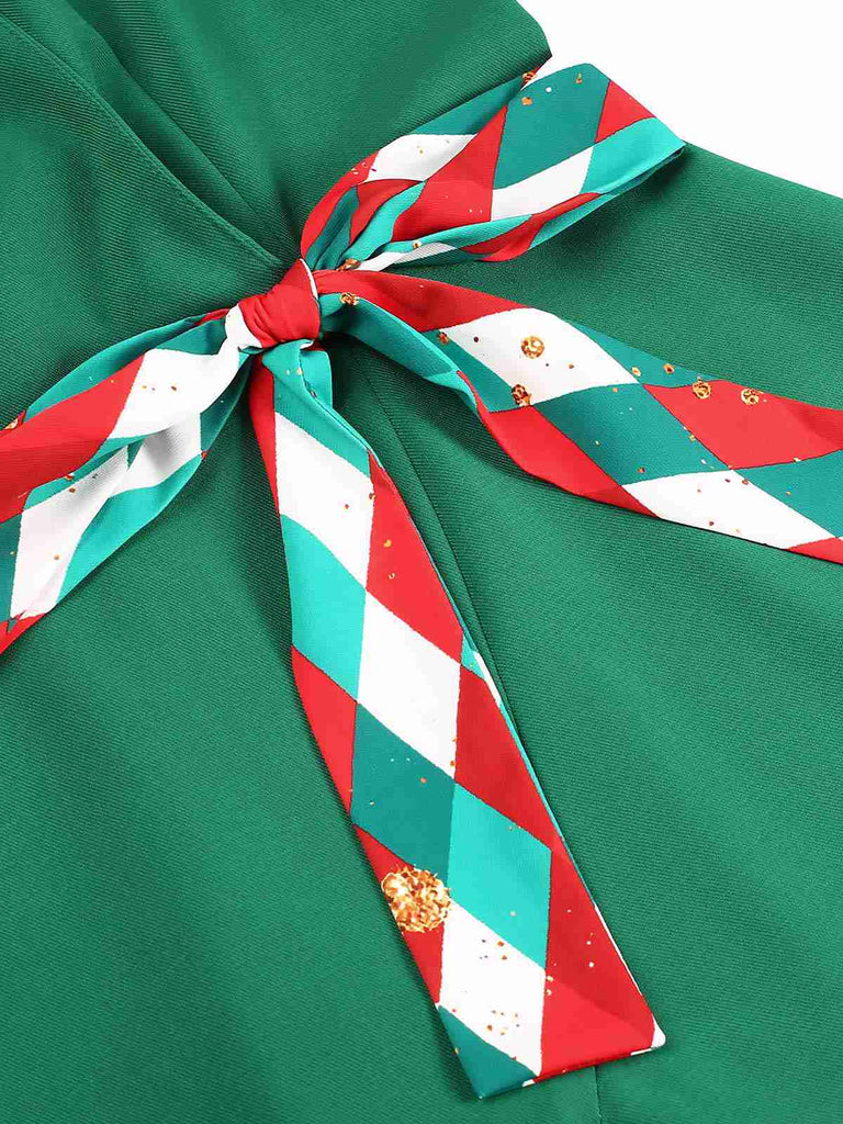 Abito con revers a pieghe a quadri colorati verde anni '40