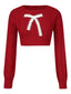 Maglione corto con fiocco natalizio rosso anni '80