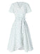 Abito floreale con cravatta obliqua in cotone bianco anni '40