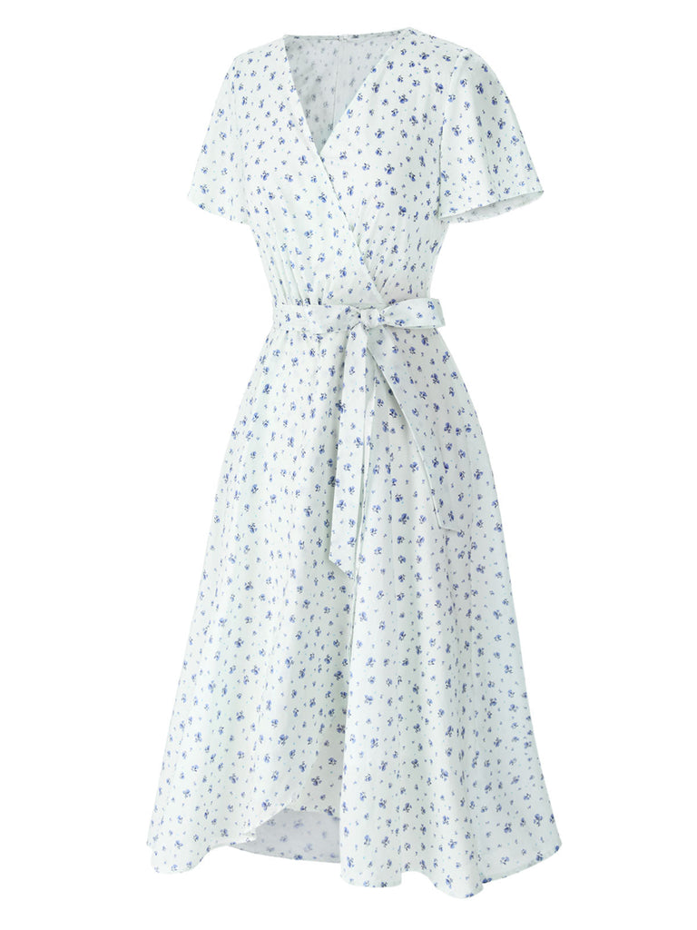 Abito floreale con cravatta obliqua in cotone bianco anni '40