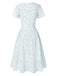 Abito floreale con cravatta obliqua in cotone bianco anni '40