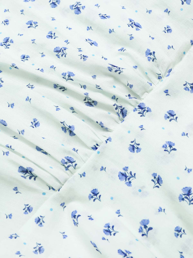 Abito floreale con cravatta obliqua in cotone bianco anni '40
