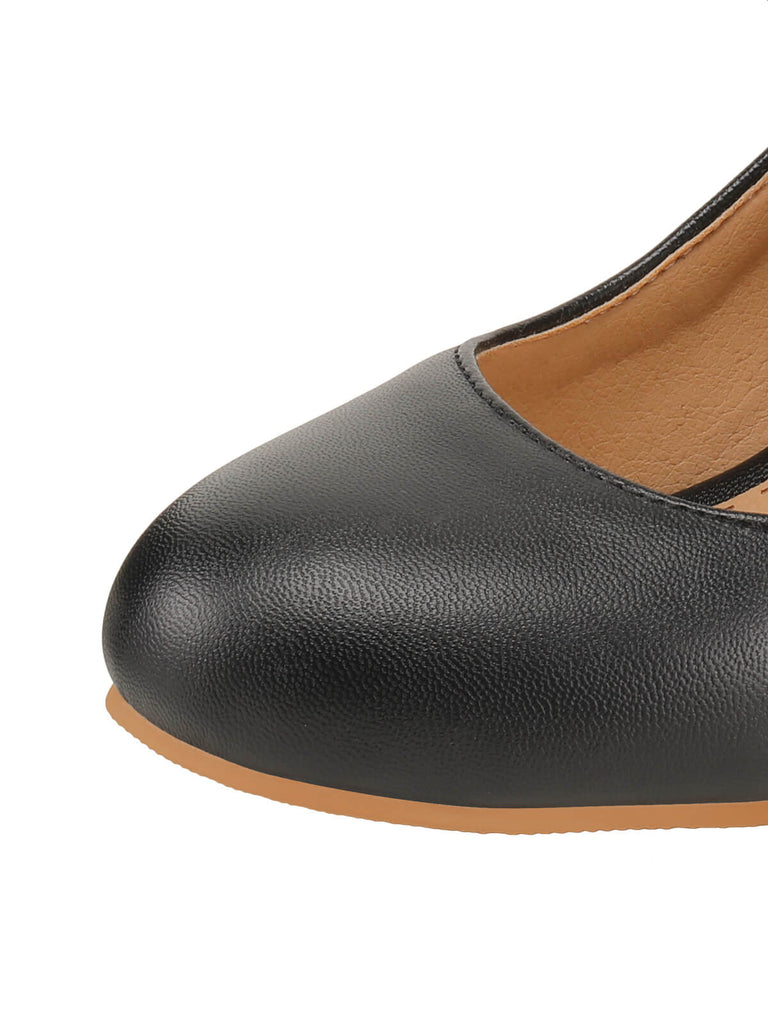 Scarpe Mary Jane con fiocco nero e tacco spesso