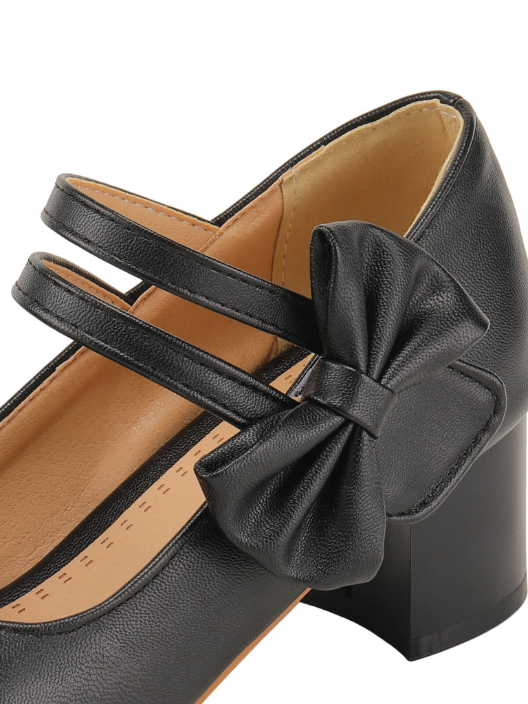Scarpe Mary Jane con fiocco nero e tacco spesso
