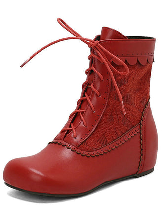 Stivali vintage con tacco interno e lacci ricamati