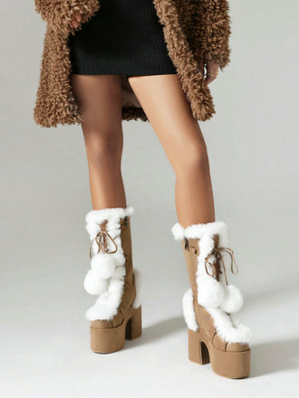 Stivali con punta tonda e tacco alto in pelliccia sintetica
