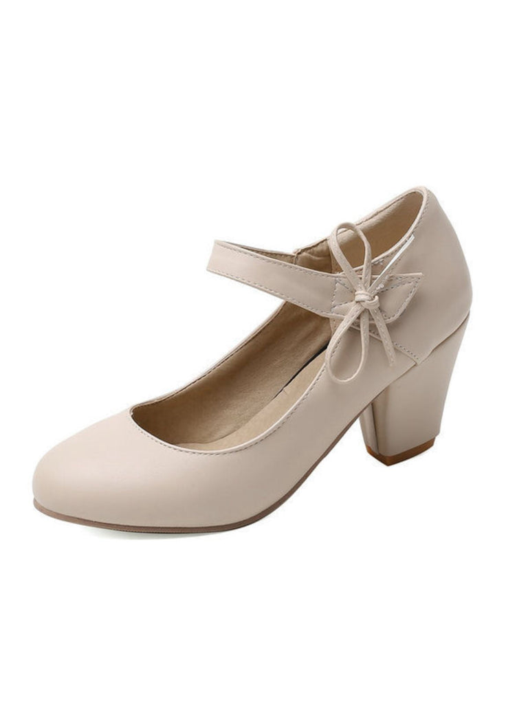 Scarpe con tacco grosso e fiocco punta tonda e tinta unita