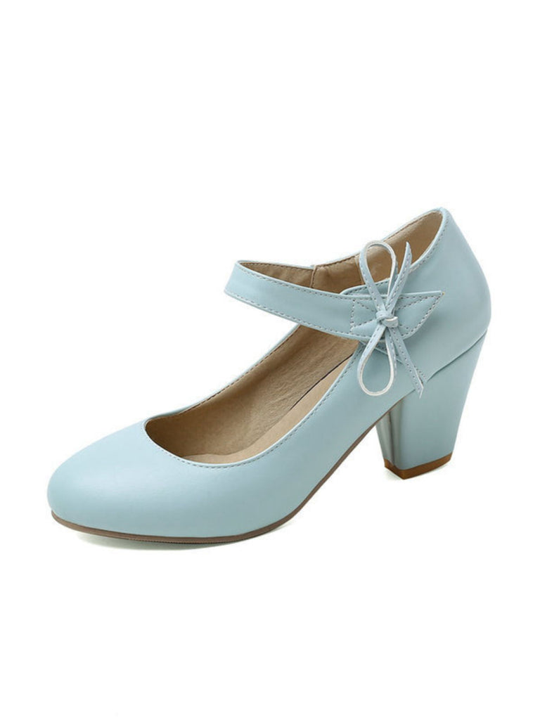 Scarpe con tacco grosso e fiocco punta tonda e tinta unita