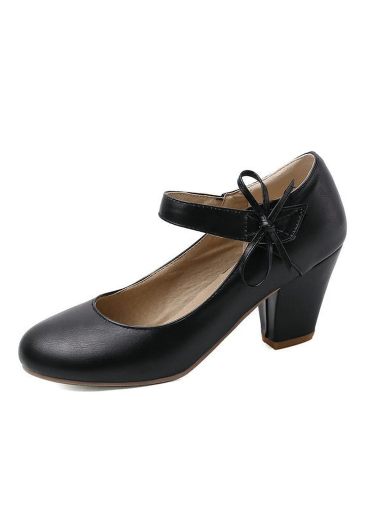 Scarpe con tacco grosso e fiocco punta tonda e tinta unita