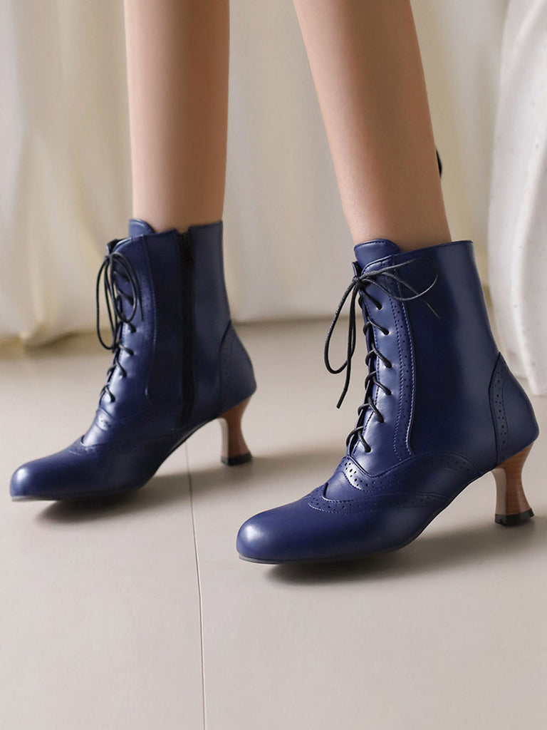 Stivali vintage in pelle con tacco a gattino
