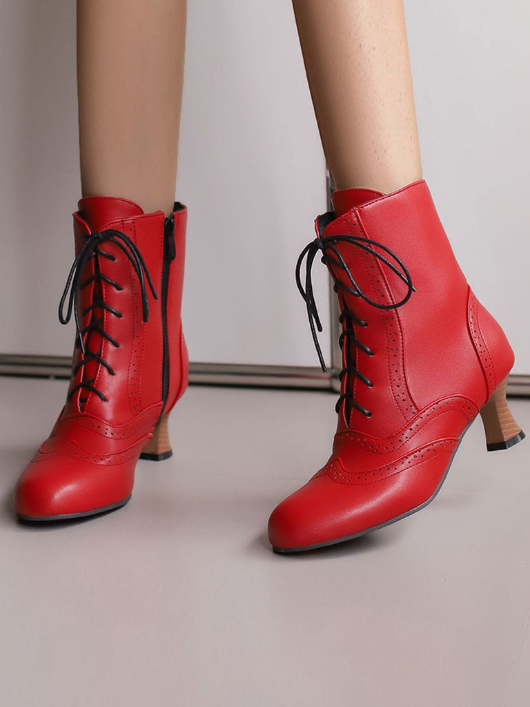 Stivali vintage in pelle con tacco a gattino