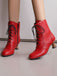 Stivali vintage in pelle con tacco a gattino